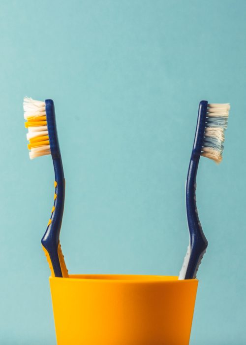 toothbrushes-facing-away-like-people